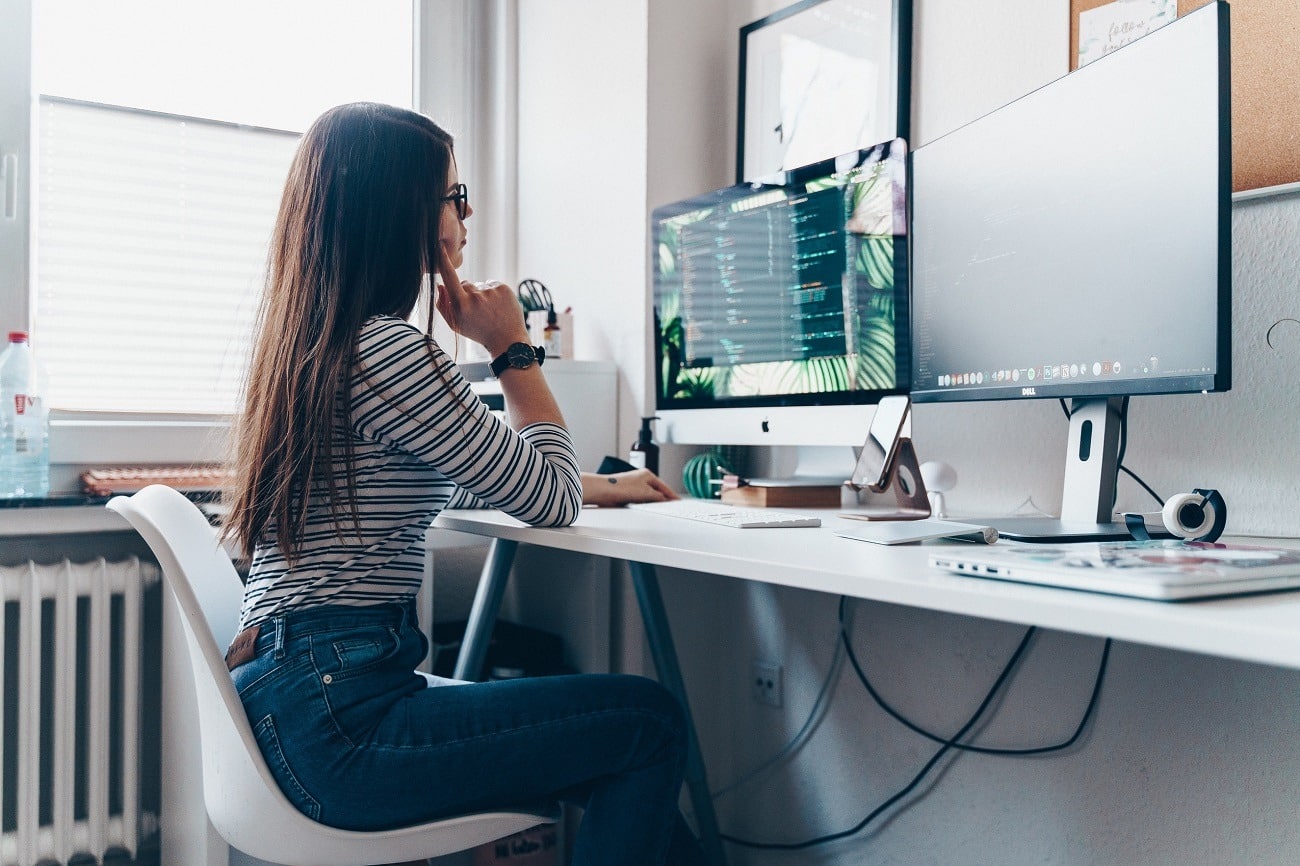 Girl sitting at a desk with good posture