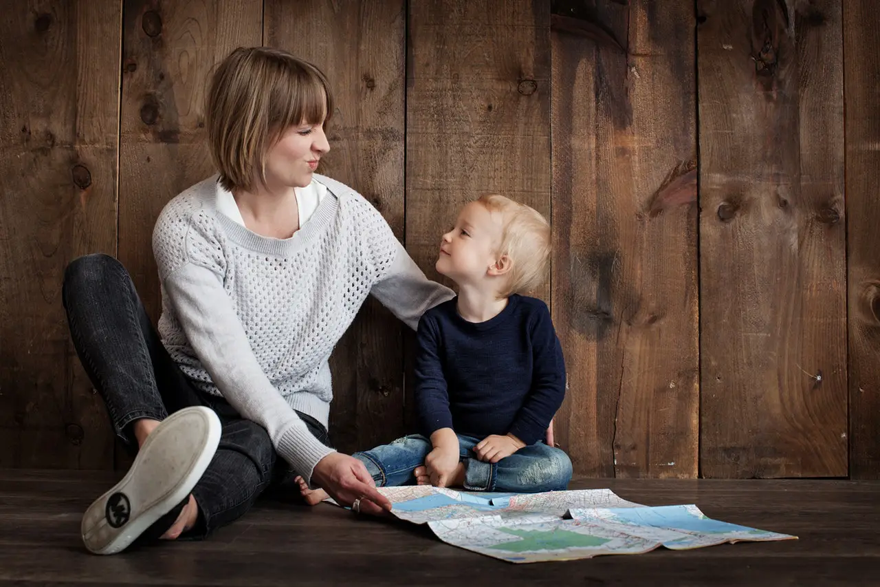 A woman with her son smiling