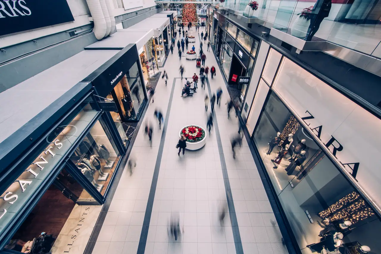 A busy mall with people shopping