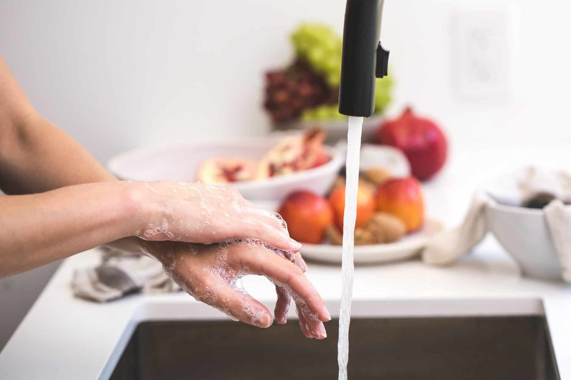 A woman washing her hands