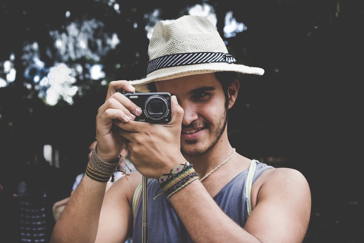 man on his camera